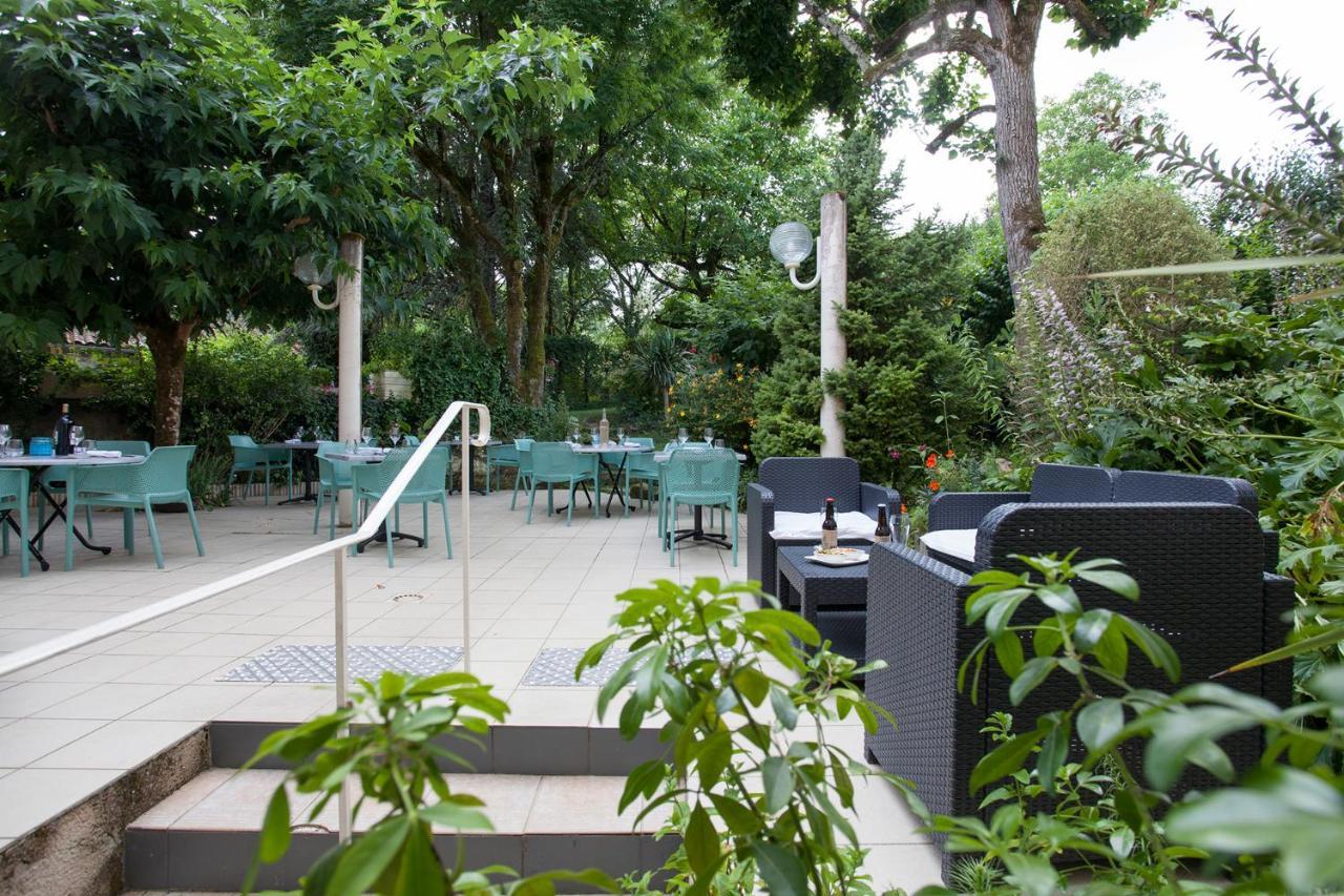 Le Lion D'Or Hotel Manzac-sur-Vern Exterior photo
