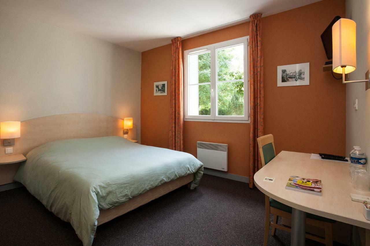 Le Lion D'Or Hotel Manzac-sur-Vern Exterior photo